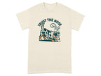 Cream t-shirt with a dog sniffing the ground and text "TRUST THE NOSE".