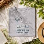 Happy Is My Resting Face Dachshund tee on a sport grey shirt, folded flat lay