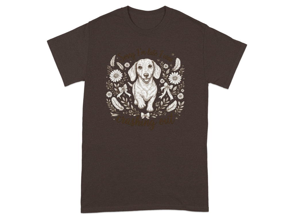 Brown t-shirt with a dachshund illustration and text "Sorry I'm late, I was crashing out."