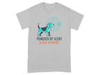 Grey t-shirt with dog illustration and "POWERED BY SCENT & BAD DECISIONS" text.