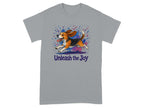 Beagle running with paint splatters and text "Unleash the Joy" on gray t-shirt.