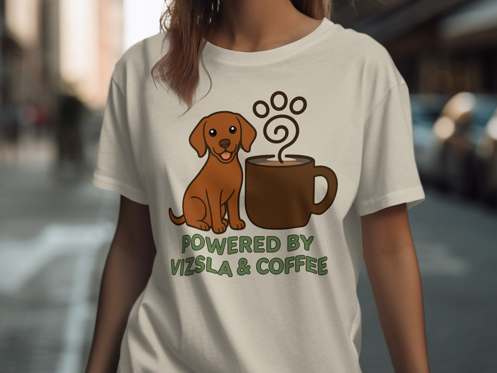 Brown dog sitting by a coffee mug with "Powered by Vizsla & Coffee" text.