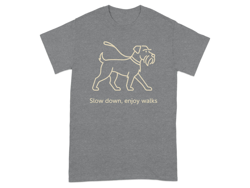 Grey t-shirt with line art of a dog on a leash and text "Slow down, enjoy walks".