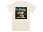 Cream t-shirt with "STAY WILD CHASE SQUIRRELS" graphic featuring a corgi and squirrel.