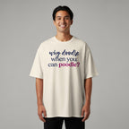 Man wearing cream t-shirt with "why doodle when you can poodle?" text.