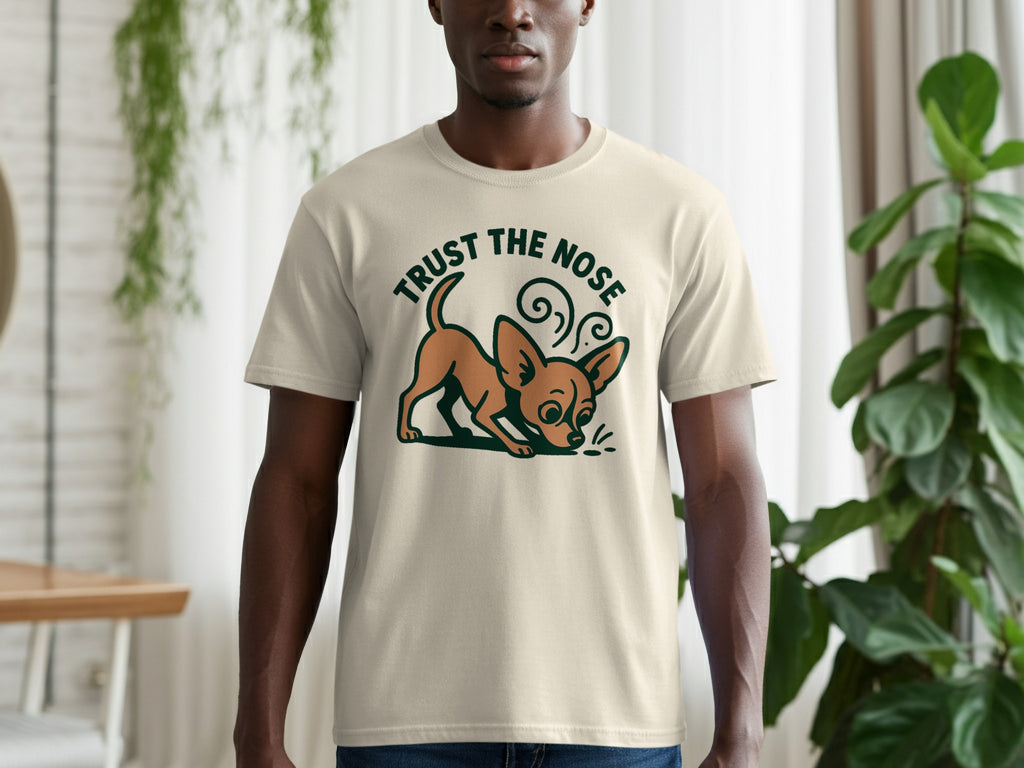 Cream t-shirt with a cartoon chihuahua sniffing and text "TRUST THE NOSE."
