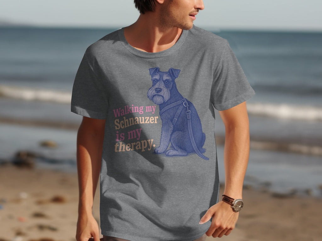 Grey t-shirt with blues and pink text and a sitting schnauzer illustration.