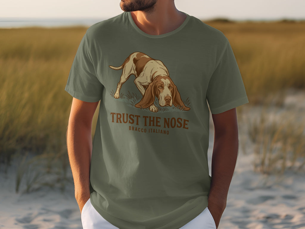 Olive green t-shirt with "BRACCO ITALIANO TRUST THE NOSE" and a dog graphic.