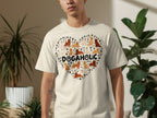 Cream t-shirt featuring a heart made of various dog breeds, with "DOGAHOLIC" text above.