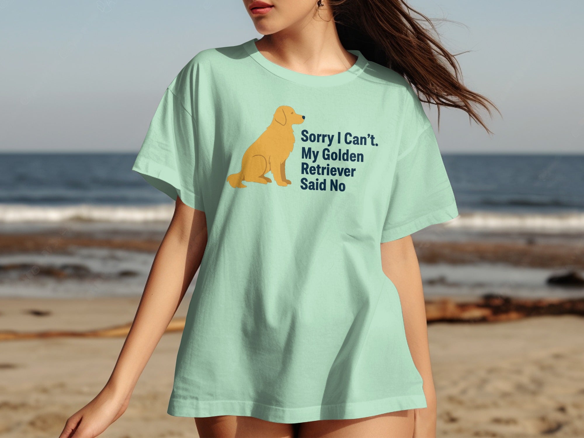 Light mint t-shirt with a golden retriever and text that says "Sorry I Can't. My Golden Retriever Said No".
