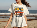 White t-shirt with "Unknown Forces Have Taken Control - The Zoomies" text and a dog.