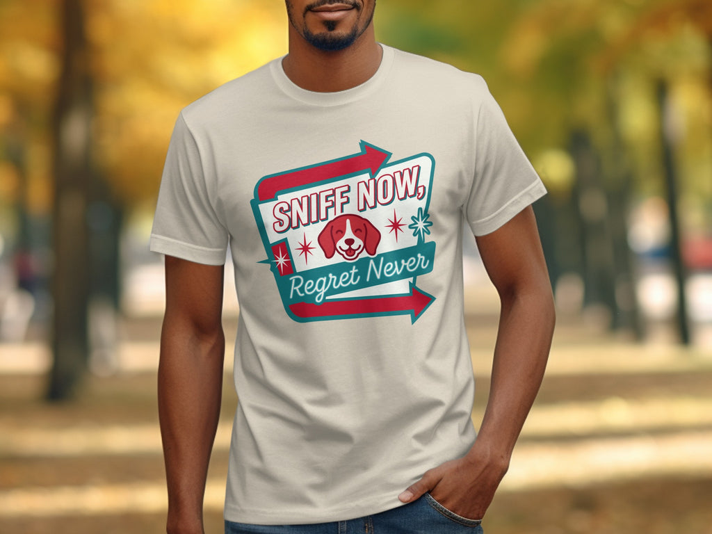 Cream t-shirt with "Sniff Now, Regret Never" and dog graphic.