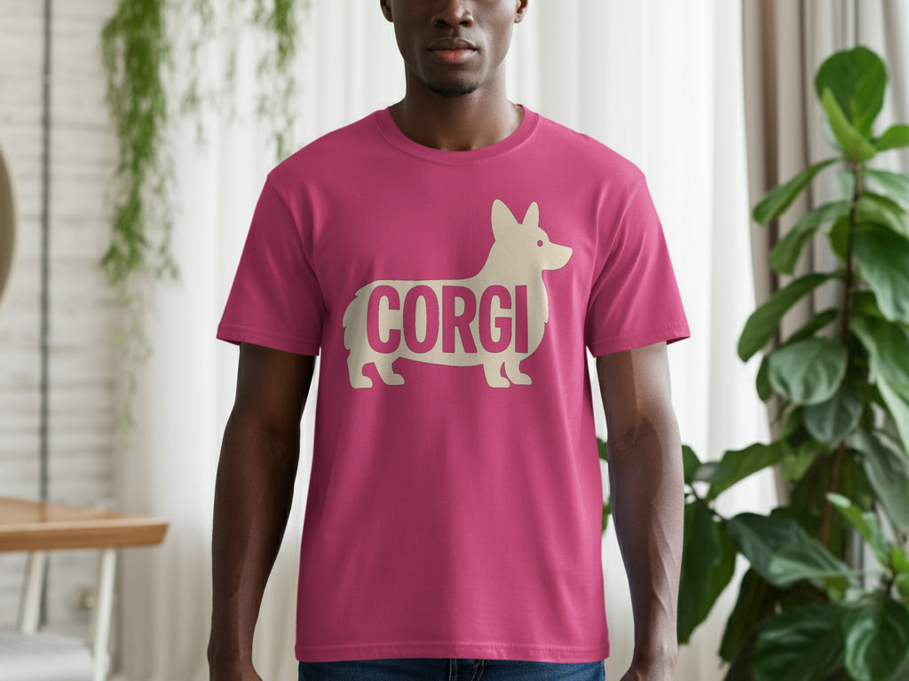 Man wearing a fuchsia t-shirt with a cream corgi silhouette and text.