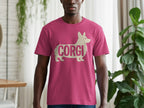 Man wearing a fuchsia t-shirt with a cream corgi silhouette and text.
