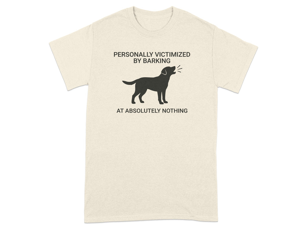 T-shirt with a dog silhouette and text: "PERSONALLY VICTIMIZED BY BARKING AT ABSOLUTELY NOTHING".