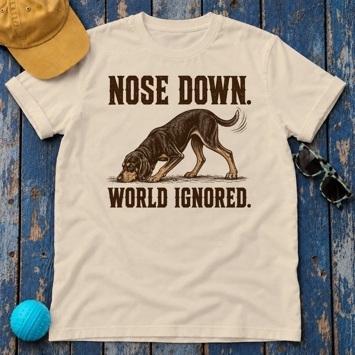 Nose Down. World Ignored. Coonhound T-shirt in Sand