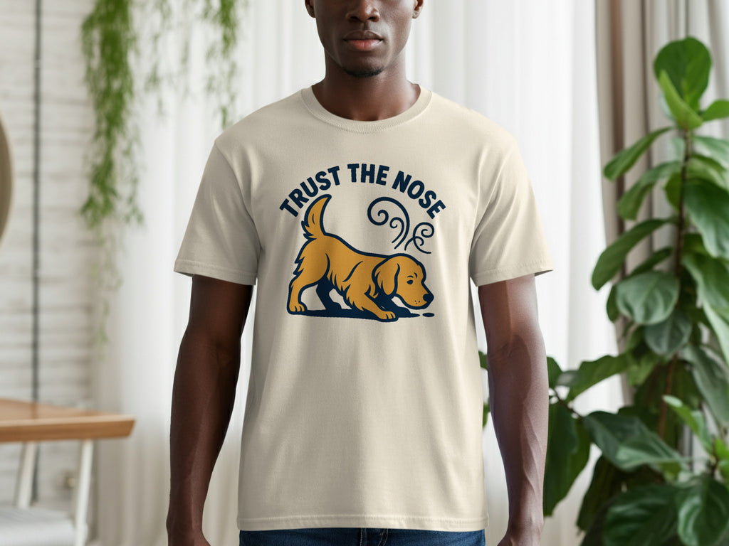 Cream t-shirt with "Trust the Nose" text and a golden dog sniffing.