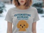 Grey t-shirt with "Outsmarting Humans Since Puppyhood" and a cartoon poodle.