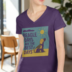 Purple t-shirt with a Beagle sitting under a sun and clouds graphic and text.