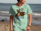 Mint t-shirt with "POWERED BY GSD & COFFEE" and a German Shepherd next to a coffee cup.