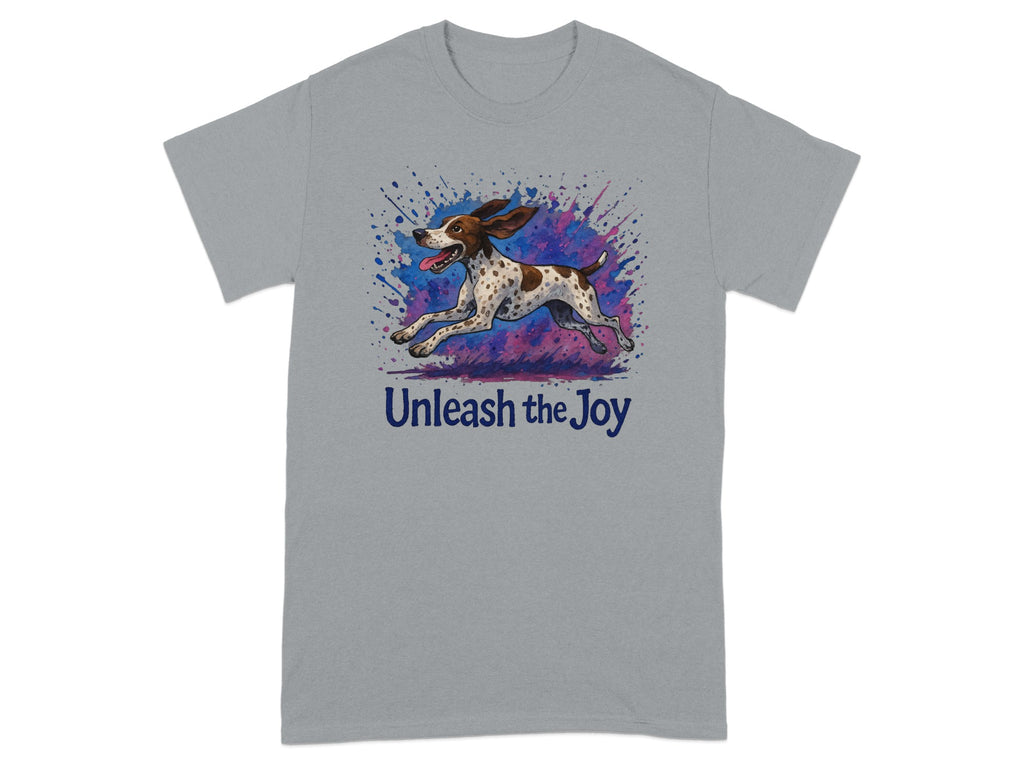 Grey t-shirt with a dog running through colorful paint splatters and text "Unleash the Joy."