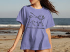 Lavender t-shirt with a pug graphic and "Slow down, enjoy walks" text.