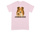 Sheltie dog with paw raised on pink t-shirt saying "ATTENTION WILL BE GIVEN!"