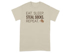 T-shirt with "EAT. SLEEP. STEAL SOCKS. REPEAT." text and dog graphic.