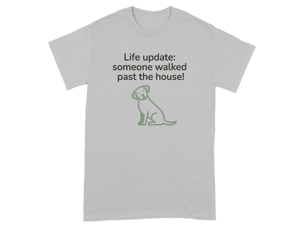Grey t-shirt with text "Life update: someone walked past the house!" and a dog illustration.
