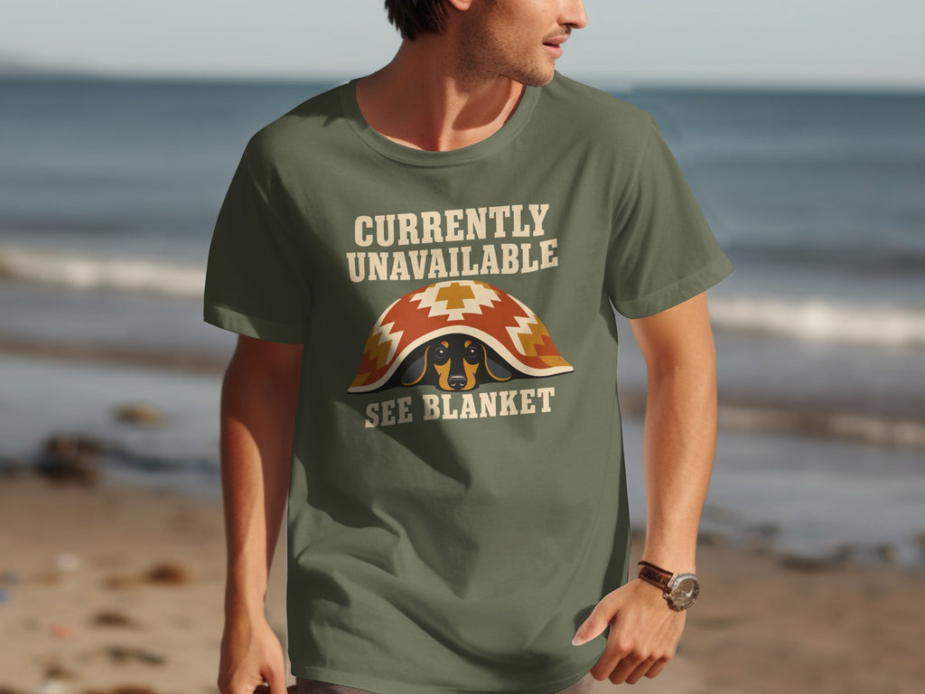 Olive t-shirt with "Currently Unavailable See Blanket" and a dachshund under a blanket.