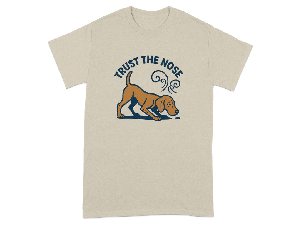 Tan t-shirt with a brown dog sniffing the ground and text "TRUST THE NOSE".