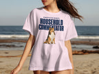 Pink t-shirt with "PROFESSIONAL HOUSEHOLD COMMENTATOR" text and a dog.