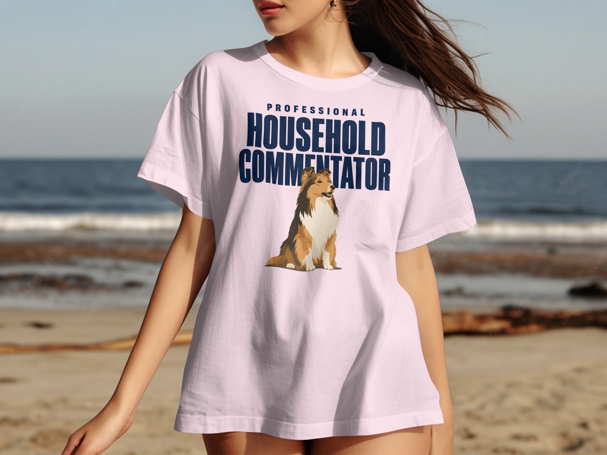 Pink t-shirt with "PROFESSIONAL HOUSEHOLD COMMENTATOR" text and a dog.