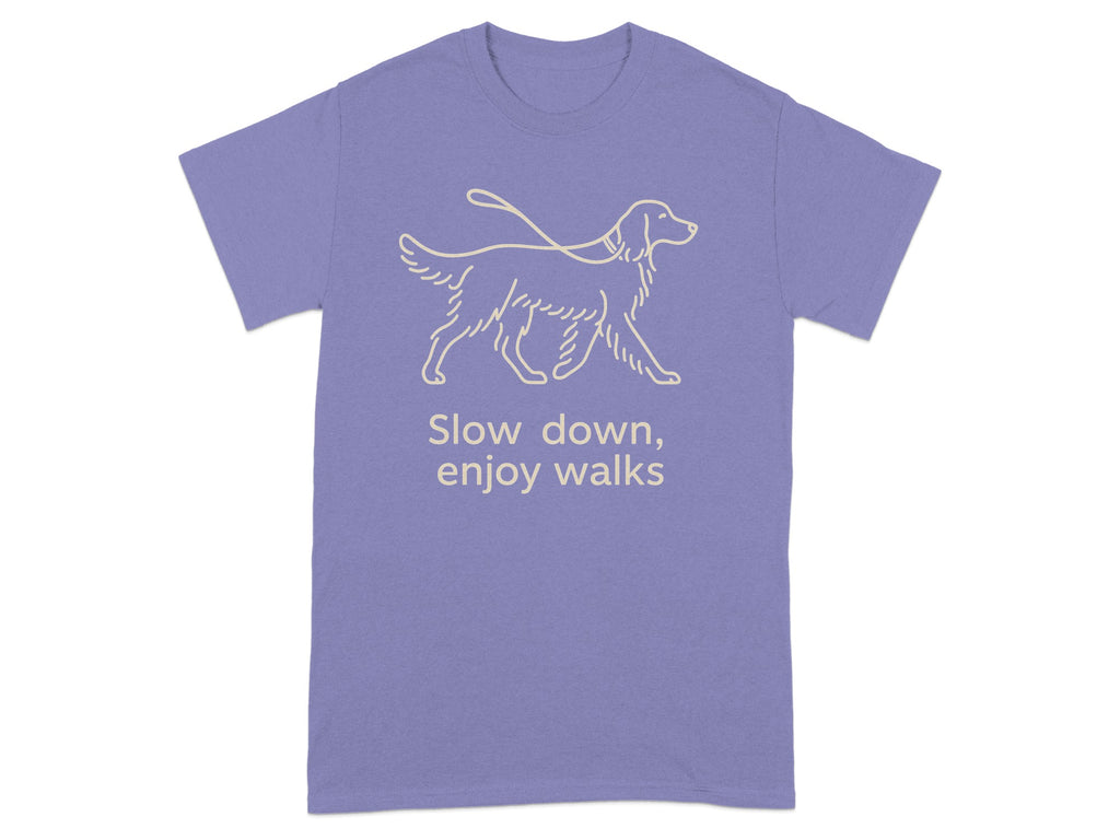 Purple t-shirt with a tan line drawing of a dog on a leash and text.