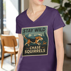 Purple t-shirt with vintage graphic: "STAY WILD CHASE SQUIRRELS" and beagle dog.