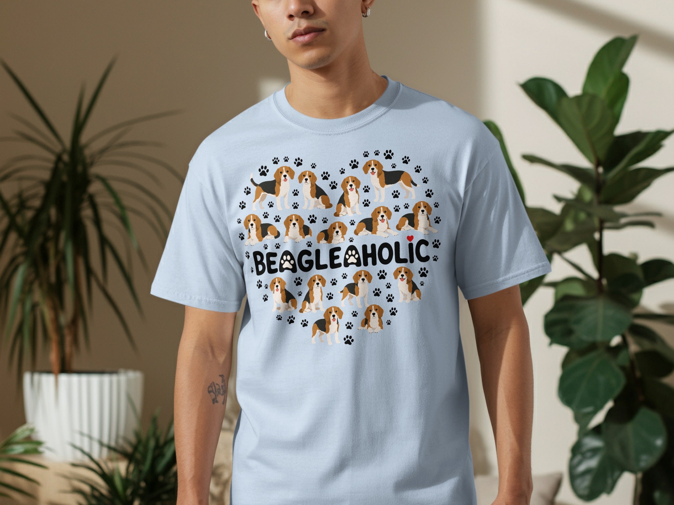 Light blue t-shirt with a heart made of beagles and "BEAGLEHOLIC" text.