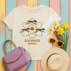 German Shorthaired Pointer Zoomies Atomic Model Tee styled flat lay on Natural