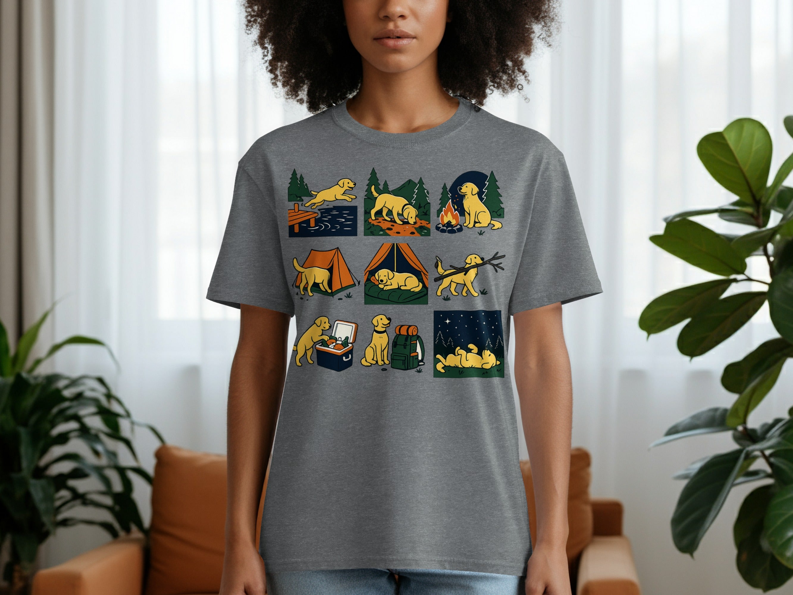Gray t-shirt with nine cartoon panels of yellow dogs camping and enjoying outdoor activities.