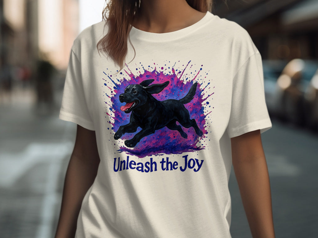 Black dog running with colorful splatters and text "Unleash the Joy".