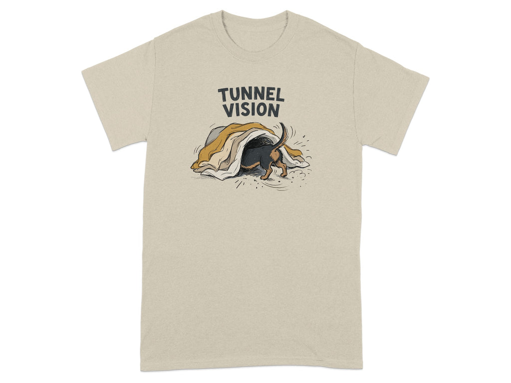 Beige t-shirt with a cartoon dog peeking out from under a blanket.