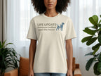 T-shirt with text "LIFE UPDATE Someone walked past the house" and a dog silhouette.