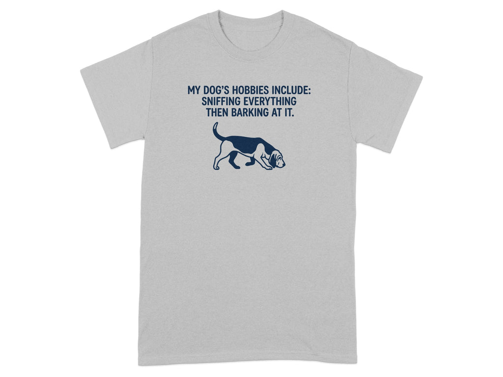 Grey t-shirt with a dog and text: MY DOG'S HOBBIES INCLUDE: SNIFFING EVERYTHING THEN BARKING AT IT.
