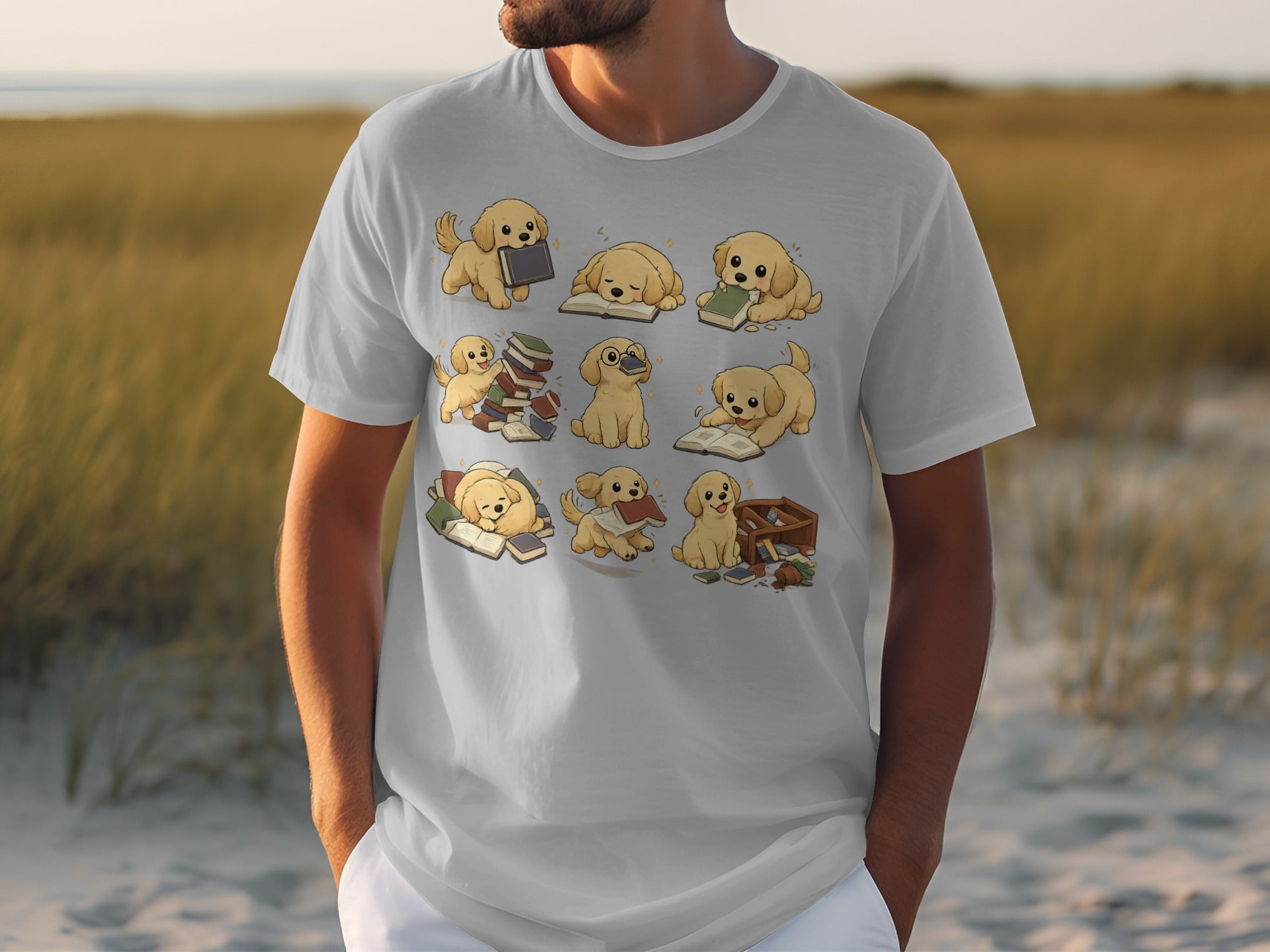 Cartoony golden retriever puppies interacting with books in various poses on a white t-shirt.