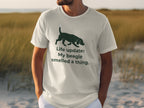 White t-shirt with a beagle silhouette and text "Life update: My beagle smelled a thing."