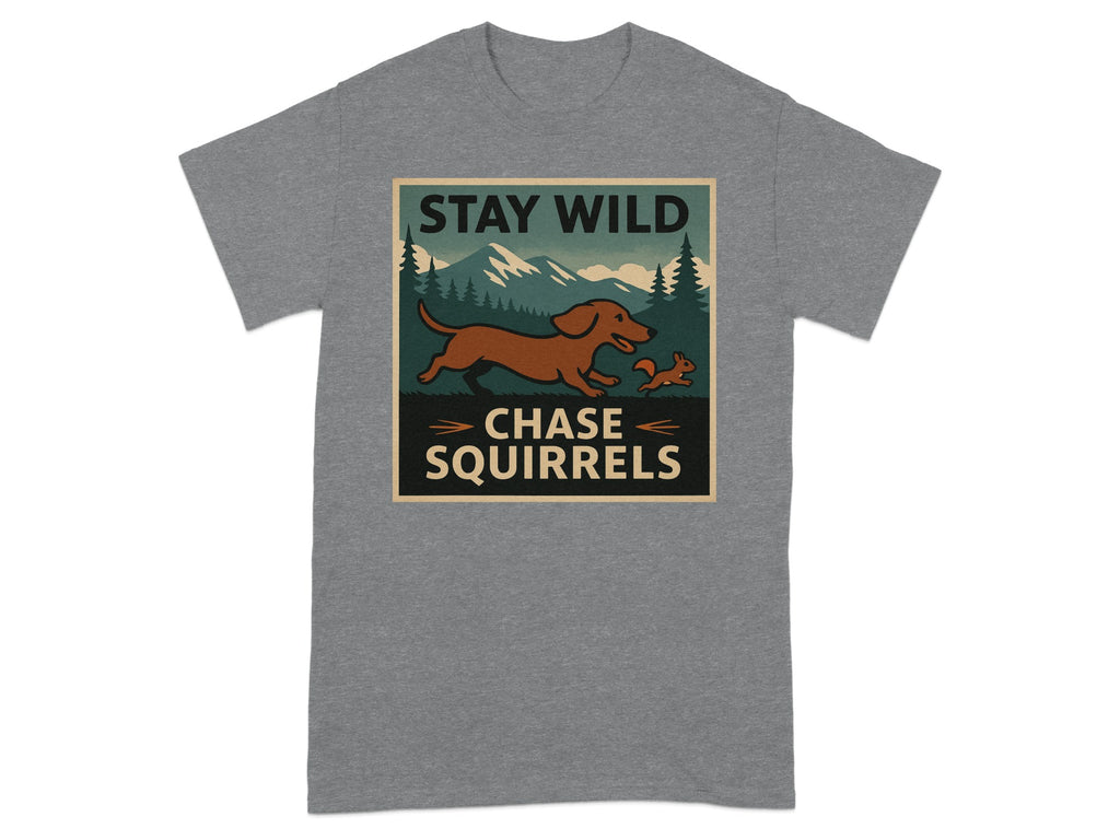 Brown dachshund chasing a squirrel with mountains and trees behind, text says "STAY WILD CHASE SQUIRRELS".
