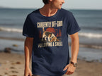 Navy t-shirt with beagle on beach, text "CURRENTLY OFF-GRID FOLLOWING A SMELL".