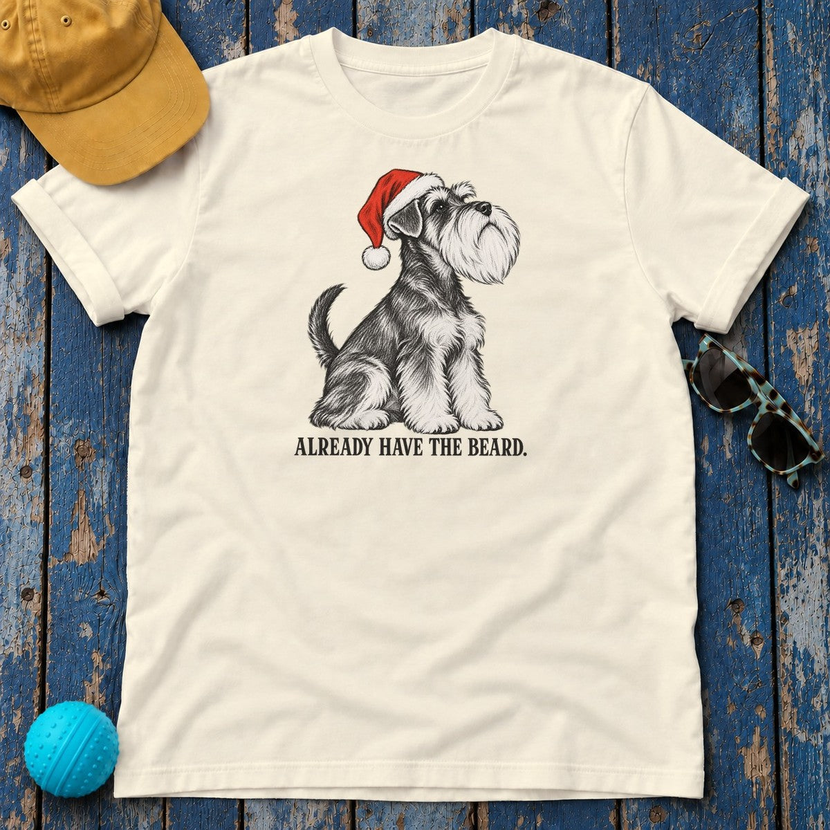 Already Have the Beard Schnauzer Santa T-Shirt in Natural - flat lay