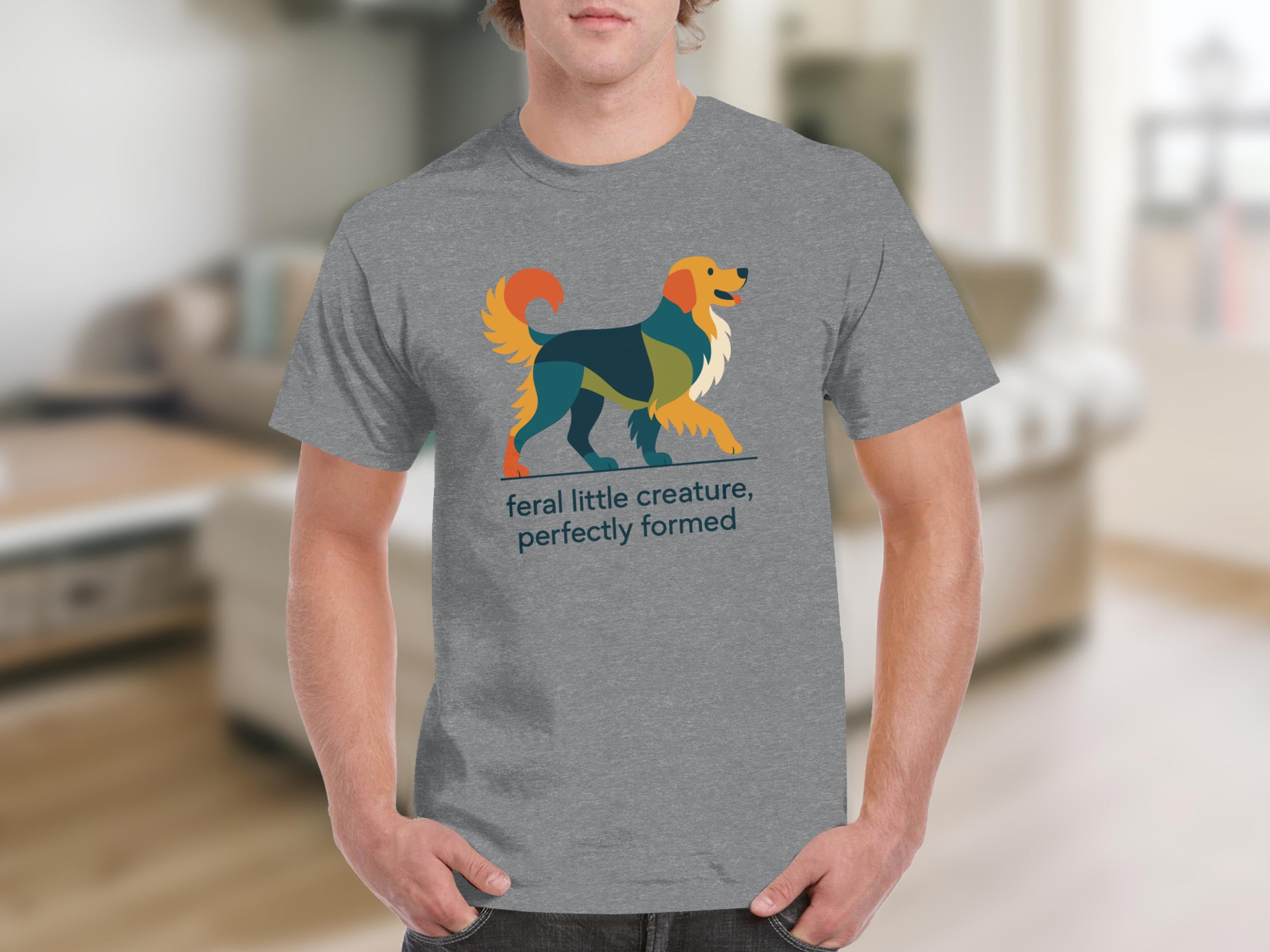 Grey t-shirt with modern abstract dog art and text "feral little creature, perfectly formed."