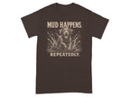 Brown t-shirt with a dog splashing in mud and text "MUD HAPPENS REPEATEDLY."