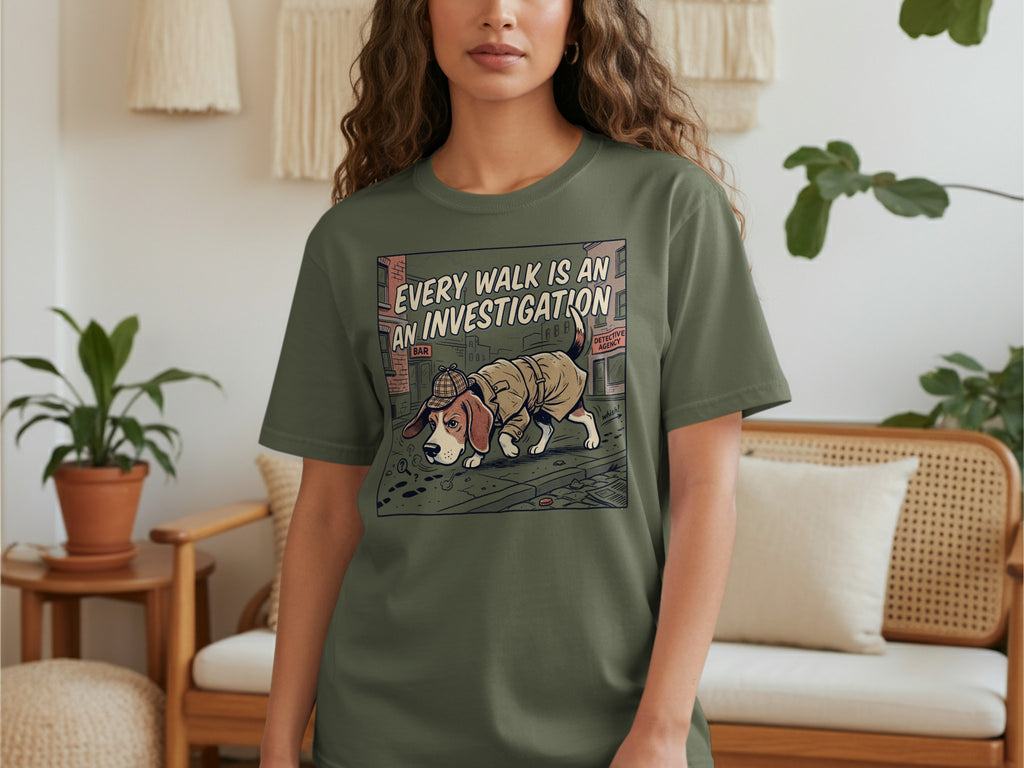T-shirt with illustration of a beagle detective on a dark green background.